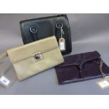 Tanner Krolle beige leather clutch bag with metal clasp,