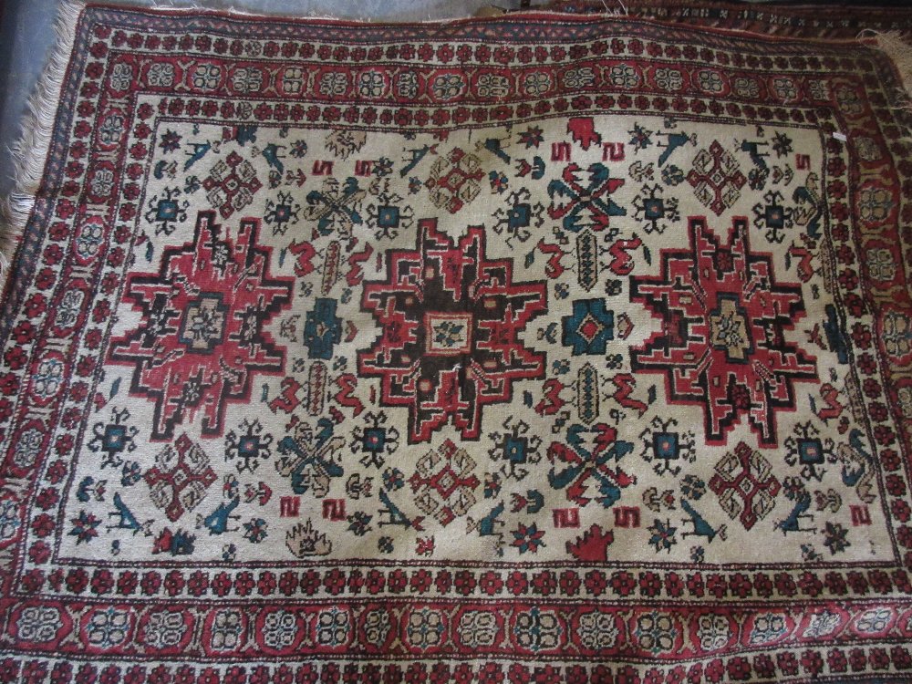 Kazak style rug and a Pakistan Bokhara rug