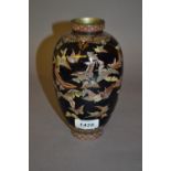 Early 20th Century Japanese cloisonné baluster form vase decorated with butterflies (a/f)