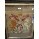 19th Century gros point picture of a coat of arms in an ebonised frame