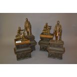 Set of four unusual 19th Century cast iron and bronze mounted figural fireplace mounts