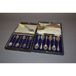 Two cased sets of six silver tea and coffee spoons,