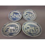 Group of four antique Chinese blue and white stoneware plates decorated with deer in landscapes,