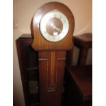 1930's Oak cased two train grandmother clock with silvered chapter ring having Arabic numerals