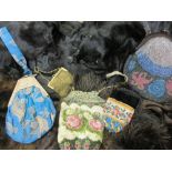 Quantity of various ladies evening bags together with a quantity of fur stoles etc