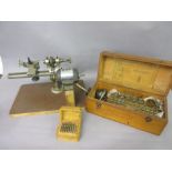 Watchmakers lathe with various cased accessories