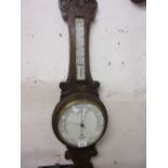 Early 20th Century carved oak aneroid barometer thermometer by Dollond (a/f)