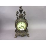 19th Century French dark patinated bronze mantel clock of waisted floral design,