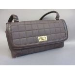 Chanel brown canvas quilted handbag with leather handles and trim