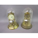 Two Edwardian brass anniversary clocks under glass domes