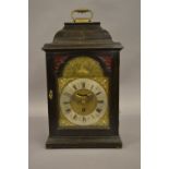 18th Century ebonised fruitwood bracket clock, the engraved brass dial with a silvered chapter ring,