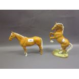 Two Beswick pottery figures of horses