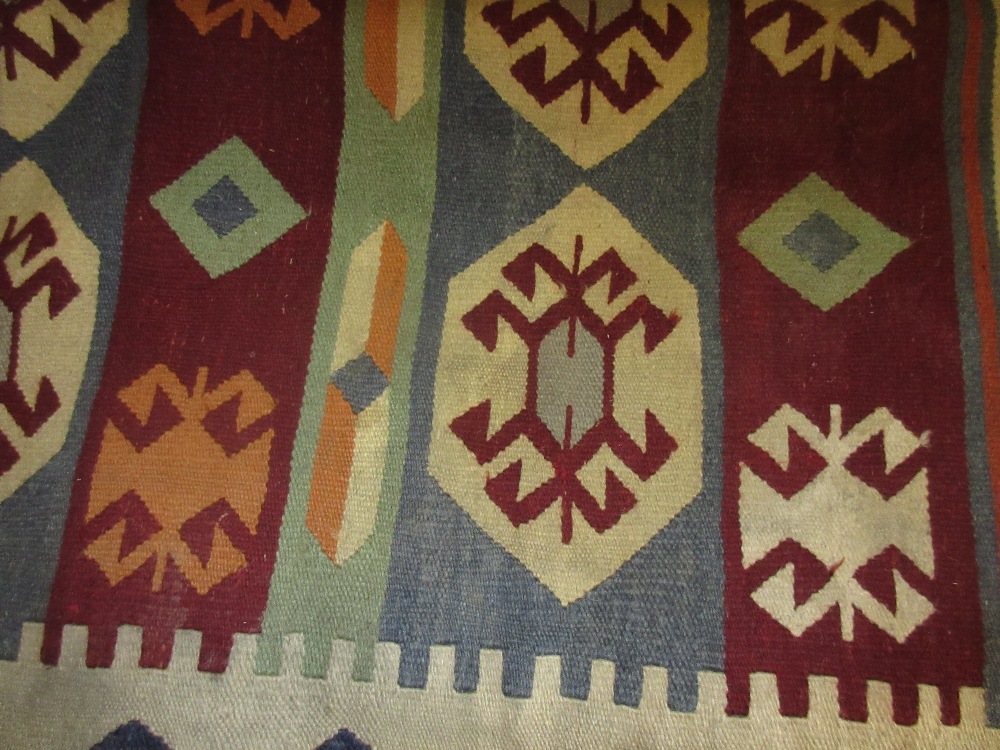 Kelim flat weave rug of geometric design with blue,