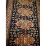 Indo Persian rug having all-over geometric birds and floral design with multiple borders on a dark