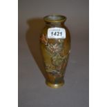 Small Japanese baluster form bronze vase relief decorated with bird in foliage