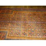 Small Belouch prayer rug with an all-over geometric design in shades of orange and claret,