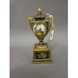 19th Century Vienna two handled pedestal vase and cover painted with vignettes of figures in