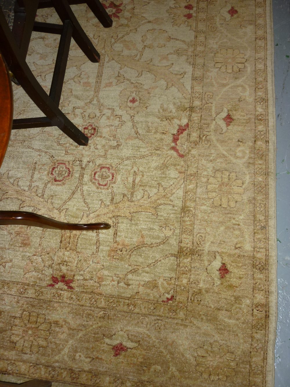 Small Afghan Ziegler carpet of floral stylised design on a beige ground,