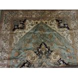 Heriz style machine woven green ground carpet, 2.30 x 1.