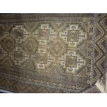 Afghan rug with two rows of six gols in shades of beige and cream together with a Turkish Caucasian