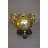 Chinese brass ball form censer with pierced cover,