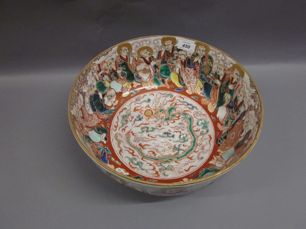 Chinese porcelain punch bowl decorated with a continuous band of figures in iron red,