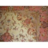 Modern Tabriz wool and silk pile carpet with a medallion and all-over stylised floral design with