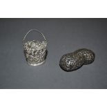 Small London silver box and cover in the form of a monkey nut together with a miniature white metal