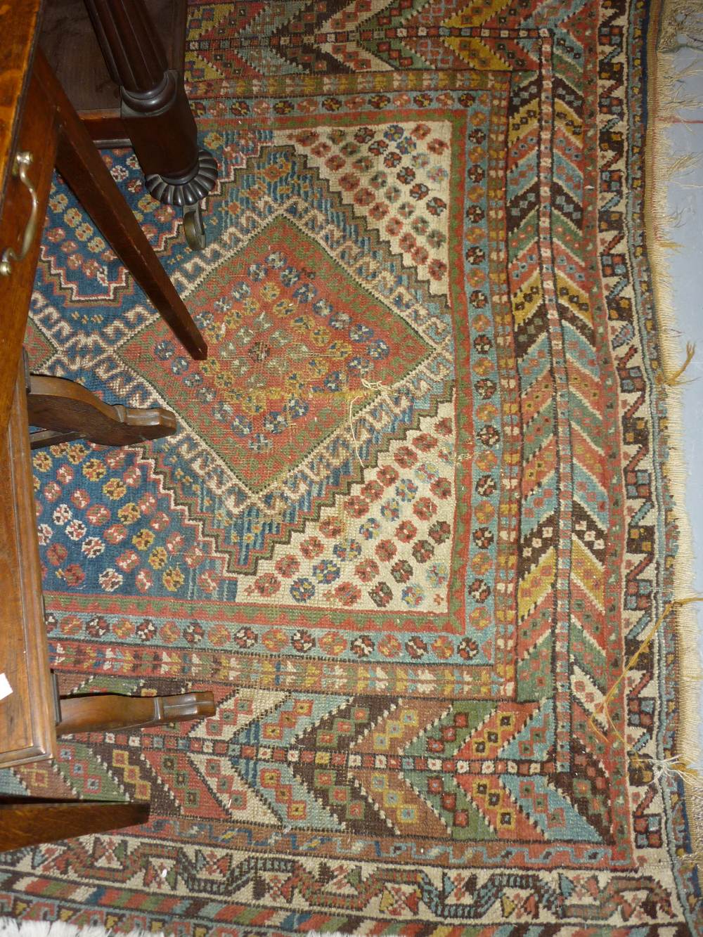 Shiraz rug with triple hooked medallion design and multiple border (a/f),