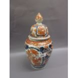 19th Century Imari vase and cover, floral decorated in red,