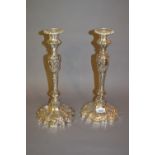 Pair of large 19th Century silver plated candlesticks with embossed decoration