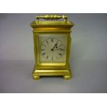 Small 18th / 19th Century brass cased carriage timepiece, the silvered dial with Roman numerals,