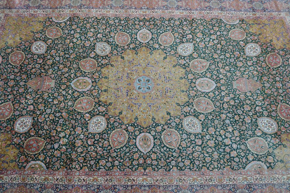Tabriz carpet with lobed medallion and all-over floral design on a green ground with corner designs - Image 2 of 5