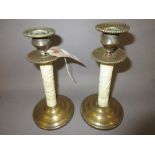 Pair of unusual 19th Century Chinese carved ivory and brass mounted candlesticks, 6.