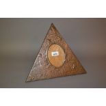 Arts and Crafts triangular photograph frame embossed with leaves and flowers