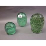 Three various 19th Century glass dump weights