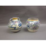 Two Carter Stabler Adams Poole Pottery baluster form vases painted with birds and flowers with