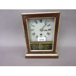 Small American single train mantel clock with a simulated rosewood case and painted glass door