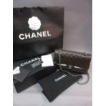 Chanel medium Uni quilted lamb skin handbag with original box etc