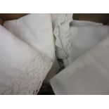 Box of various table linen including: damask, banqueting cloths,