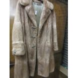 Ladies three quarter length fur coat