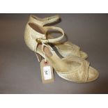 Pair of ladies Chanel cream satin covered sandals