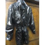 Ladies Chanel shiny black three quarter length raincoat