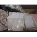 Box containing a large quantity of tray cloths, tablecloths,