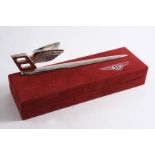 A LATE 20TH CENTURY PLATED PAPER KNIFE with the flying "B" emblem (fitted box); 7" (17.8 cms) long