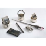 A MIXED LOT:- A nickel-plated vesta case in the form of a crab claw, an Edwardian card case, an