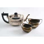 A SMALL TEA POT with a moulded girdle, inscribed, by Aldred Marston, Chester 1921 together with a