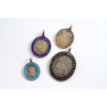 FOUR SMALL LATE 19TH/EARLY 20TH CENTURY RUSSIAN PENDANT MEDALLIONS:- Three with enamelled