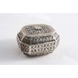 A MIDDLE / FAR EASTERN PIERCED BOX of canted rectangular form with a hinged cover & base, each