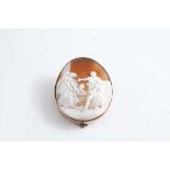 A CAMEO carved with figures including Antony and Cleopatra; 5.25 x 4.5 cms, mounted as a brooch